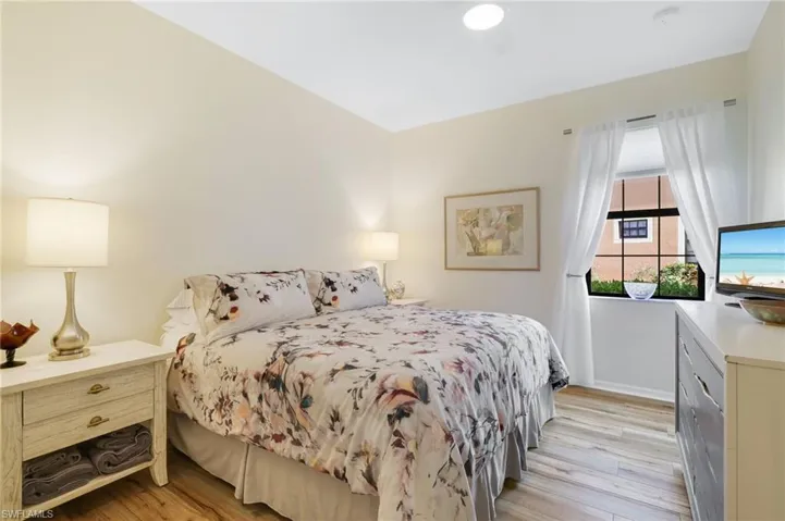 Bedroom featuring light wood-style floors and a ceiling fan