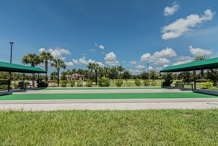 View of community with a yard