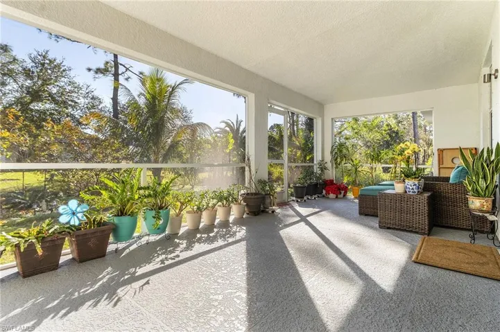 Sunroom featuring a wealth of natural light