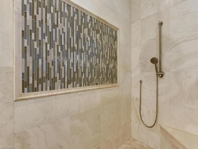 Bathroom view of tiled shower
