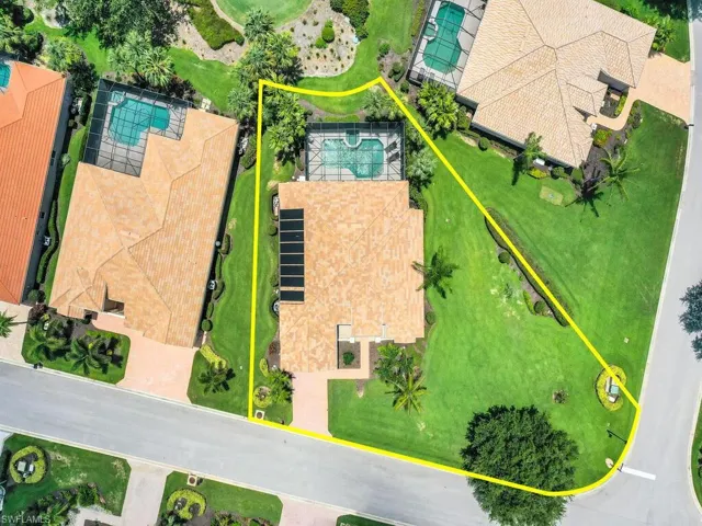 Aerial view of property's location with a pool and property boundaries highlighted