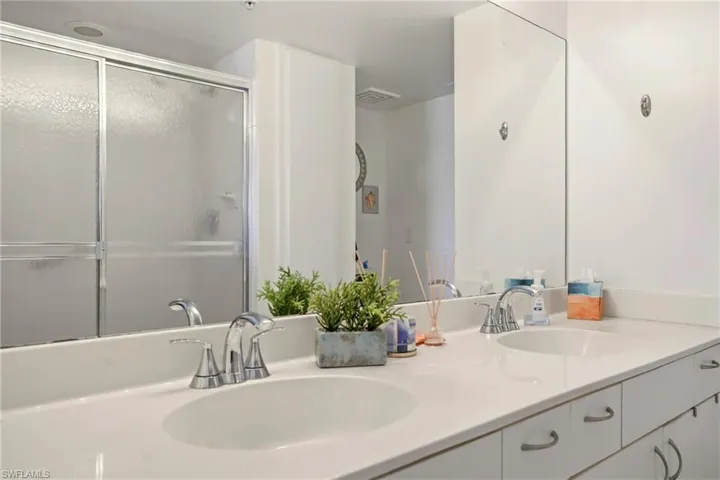 Primary bath with dual vanity and walk-in shower