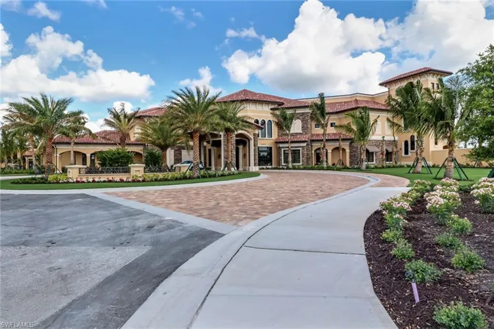 View of building exterior with driveway