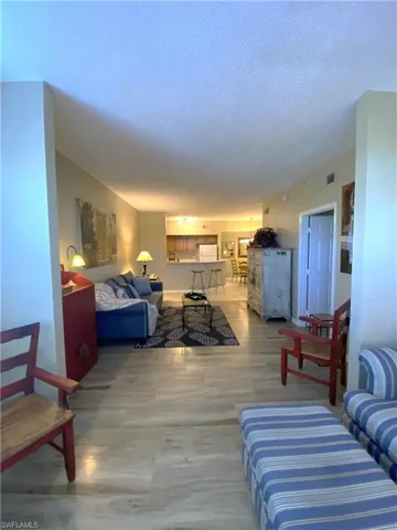 Den to Living Rm to Kitchen space