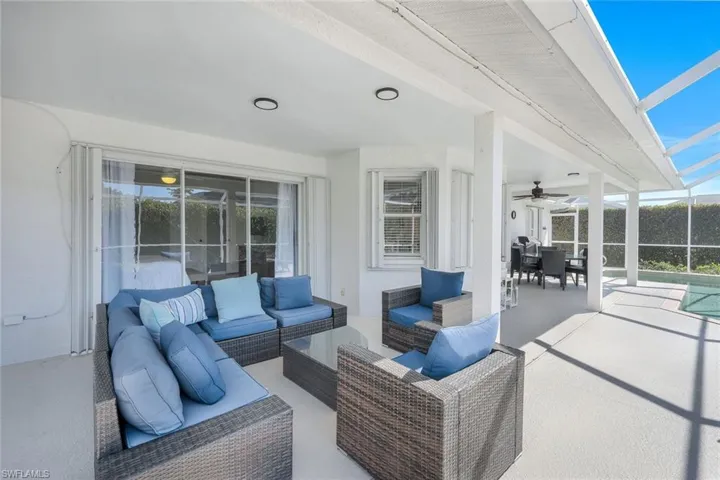 View of patio with a lanai and an outdoor hangout area