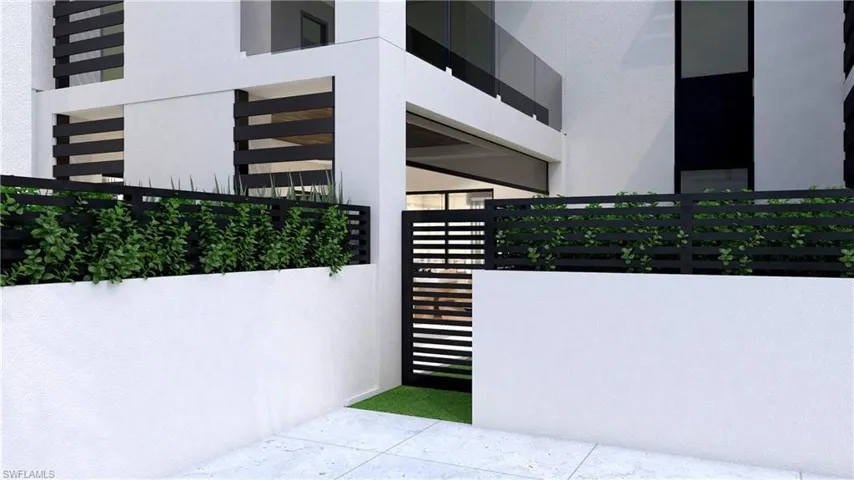 Access gate to pool from artificial turf area
