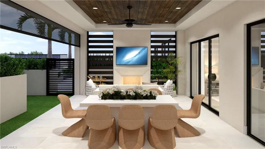 Outdoor gas fireplace on covered balcony