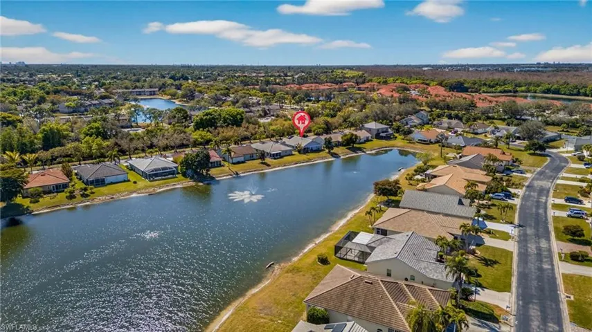 Aerial view of residential area with a nearby body of water