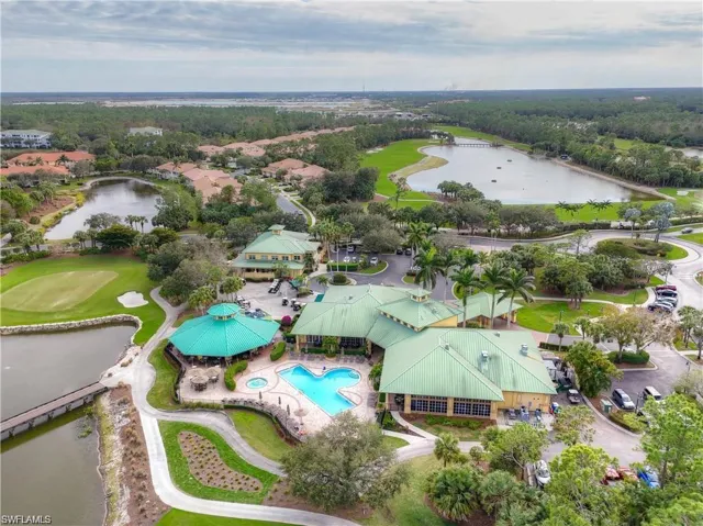 Bird's eye view with a water view and golf course view