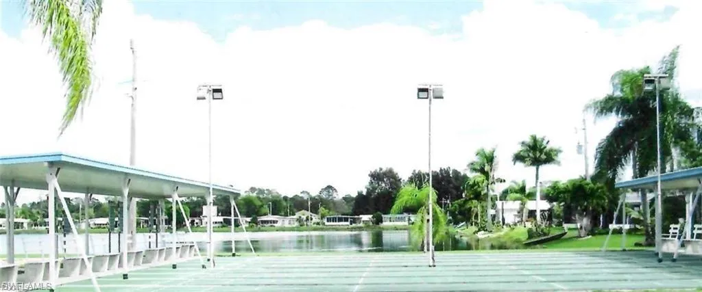 View of home's community with a water view