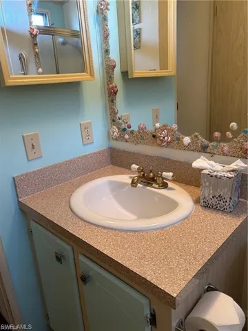 Bathroom featuring vanity