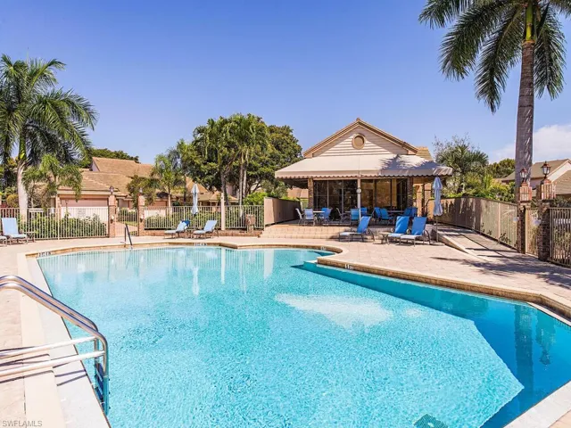 Community pool featuring a patio area