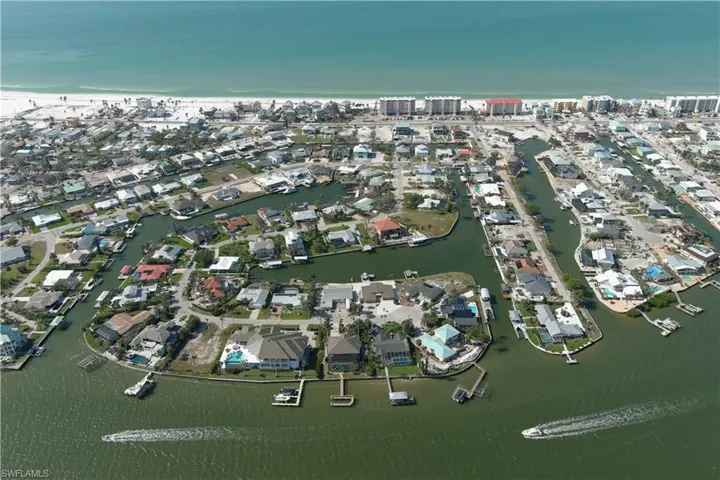 Bird's eye view with a water view and a residential view