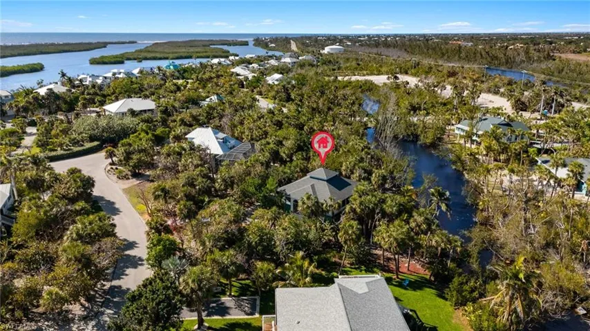 Aerial view of residential area with a large body of water