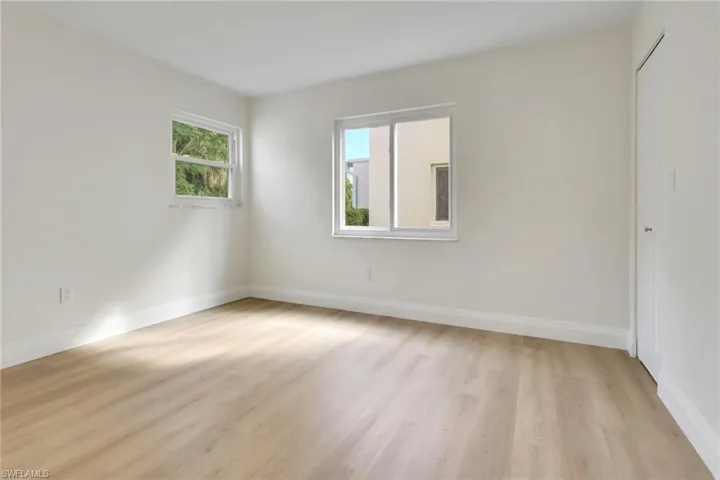 Spare room with light wood finished floors
