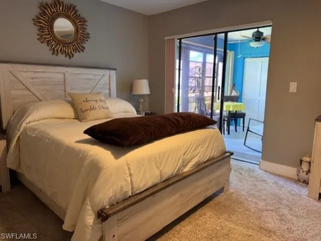 The primary bedroom has access to the screened lanai