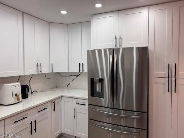 New appliances, countertops and cabinets in the updated kitchen.