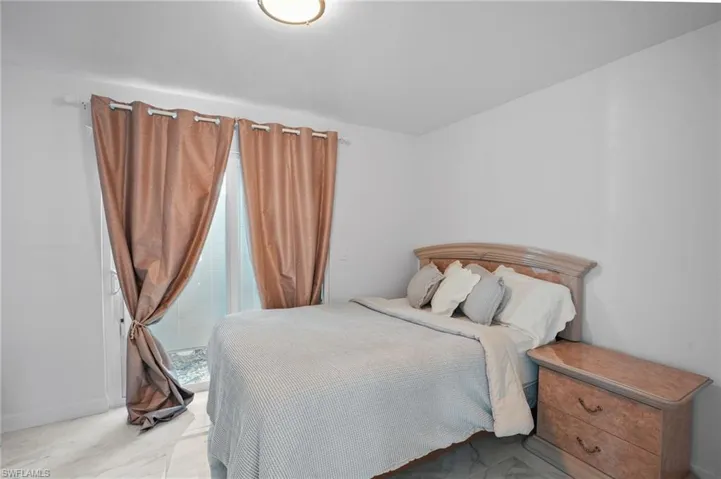 Bedroom with baseboards