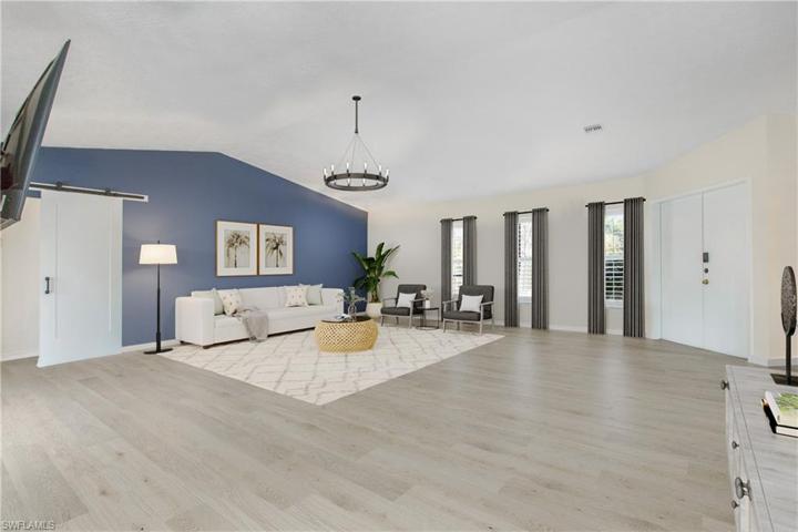 photo includes reality staging to showcase the possibility of the living area. Design services included with purchase!