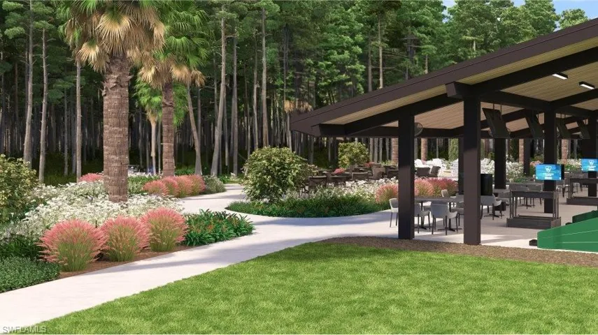 View of property's community with a yard