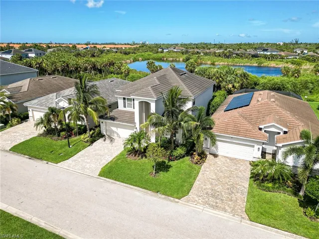 Aerial view featuring a water view