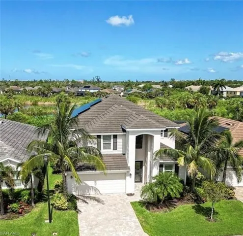 View of front of property with a garage