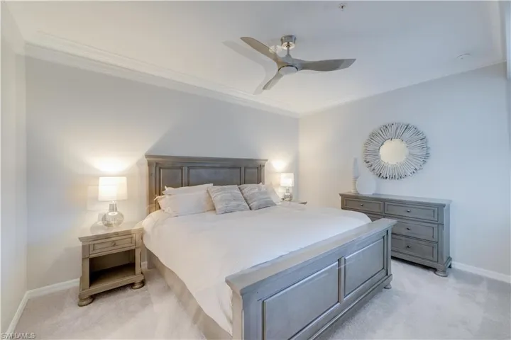 Crown molding, ceiling fan and carpet