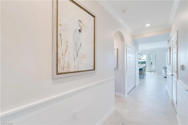 Enter and view the crown moldings, custom paint and shiplap detail