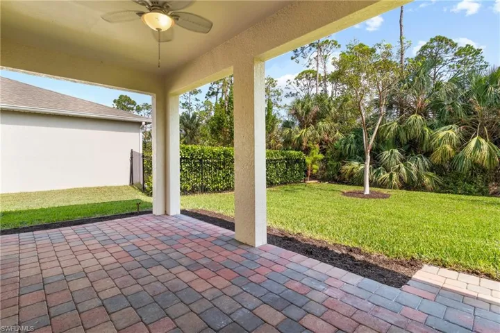 View of patio with ceiling fan
