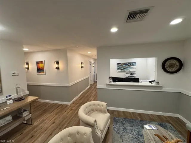 Waiting Room with hardwood / wood-style flooring