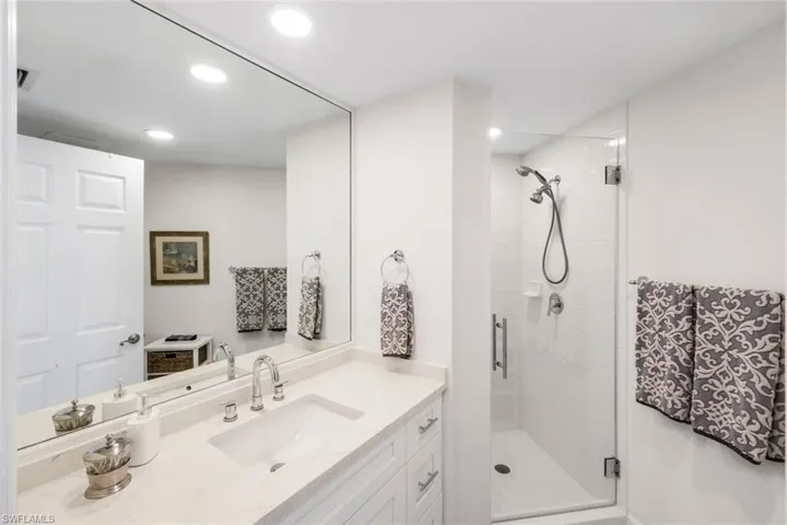 Remodeled Full Bath on Hall - Quartz & Seamless Glass
