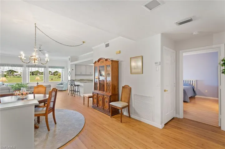 Dining room with a chandelier and New Water Proof Laminate floors