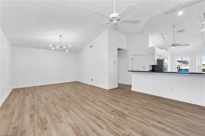 Living room with lofted ceiling