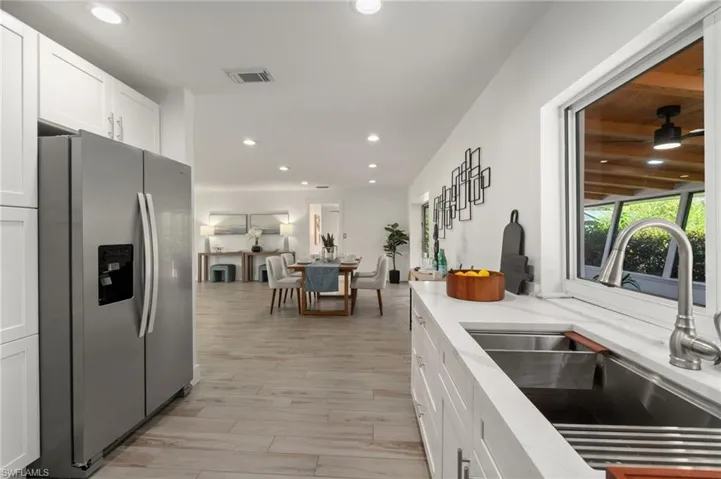 Open kitchen layout next to main living area for easy entertaining