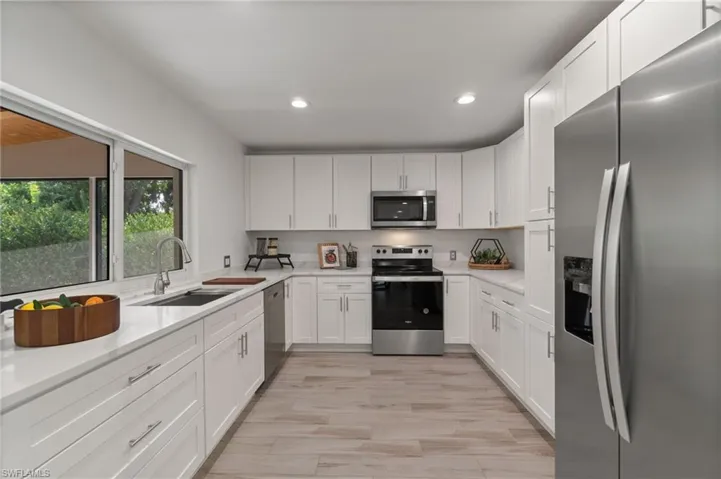 Updated kitchen featuring ample cabinetry and workspace