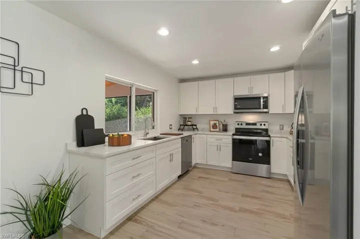 Well designed kitchen with convenient layout and modern touches