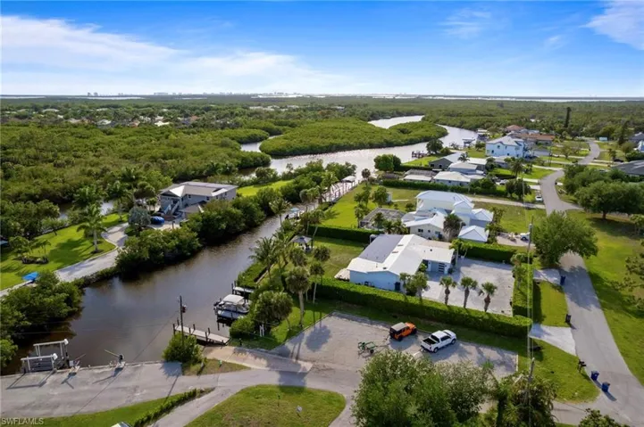 Aerial view highlighting the surrounding waterways and community