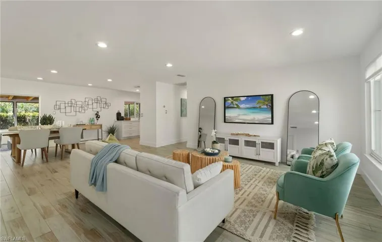 Light filled living room with generous space for relaxation and gathering