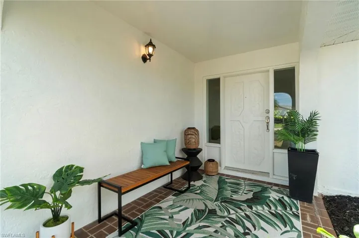 Inviting covered entry creating a warm and welcoming first impression