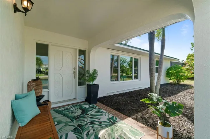 Charming front porch area ideal for relaxing and greeting guests