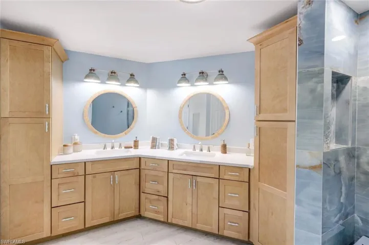 Primary Full bath featuring double vanity