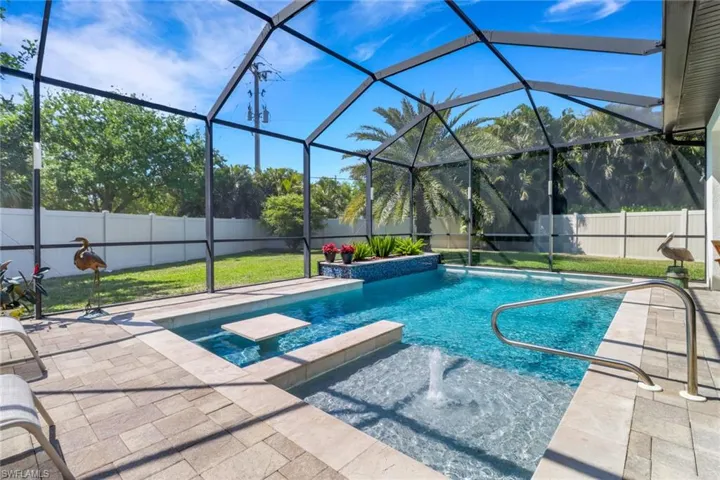 View of pool featuring a patio, a fenced in pool, and a fenced backyard