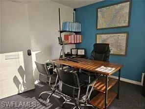View of carpeted home office