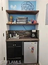 Bar featuring sink