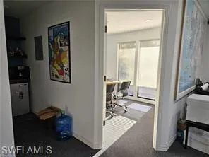 Hall with dark carpet