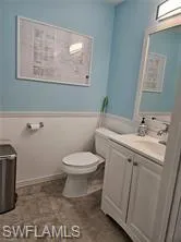 Bathroom with vanity and toilet