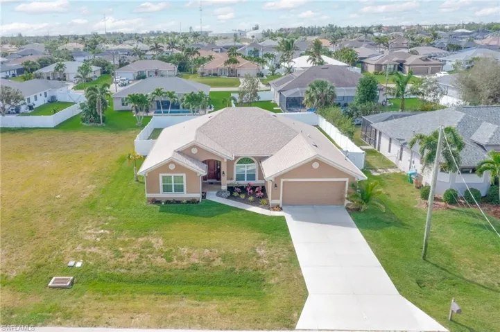 Birds eye view of property with a residential view
