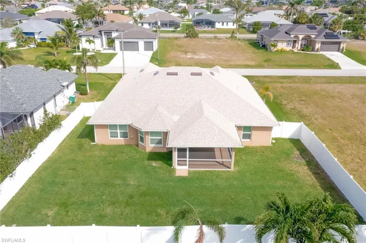 Birds eye view of property with a residential view