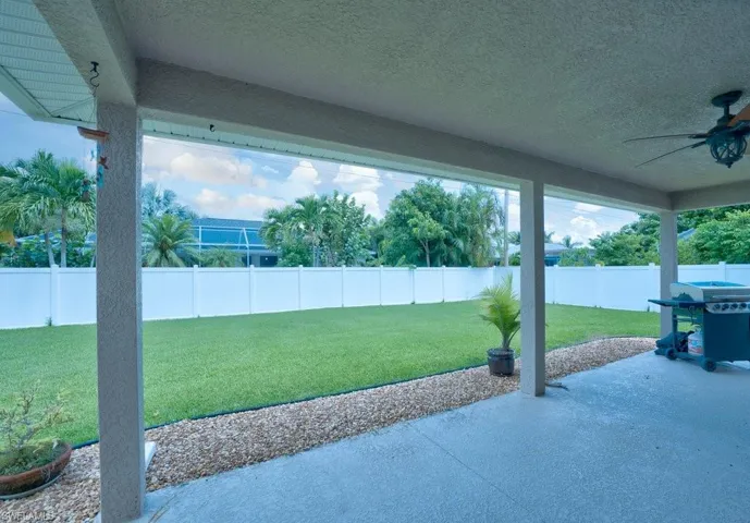 View of patio with ceiling fan
