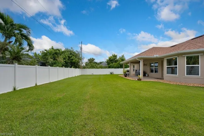 View of yard with a patio